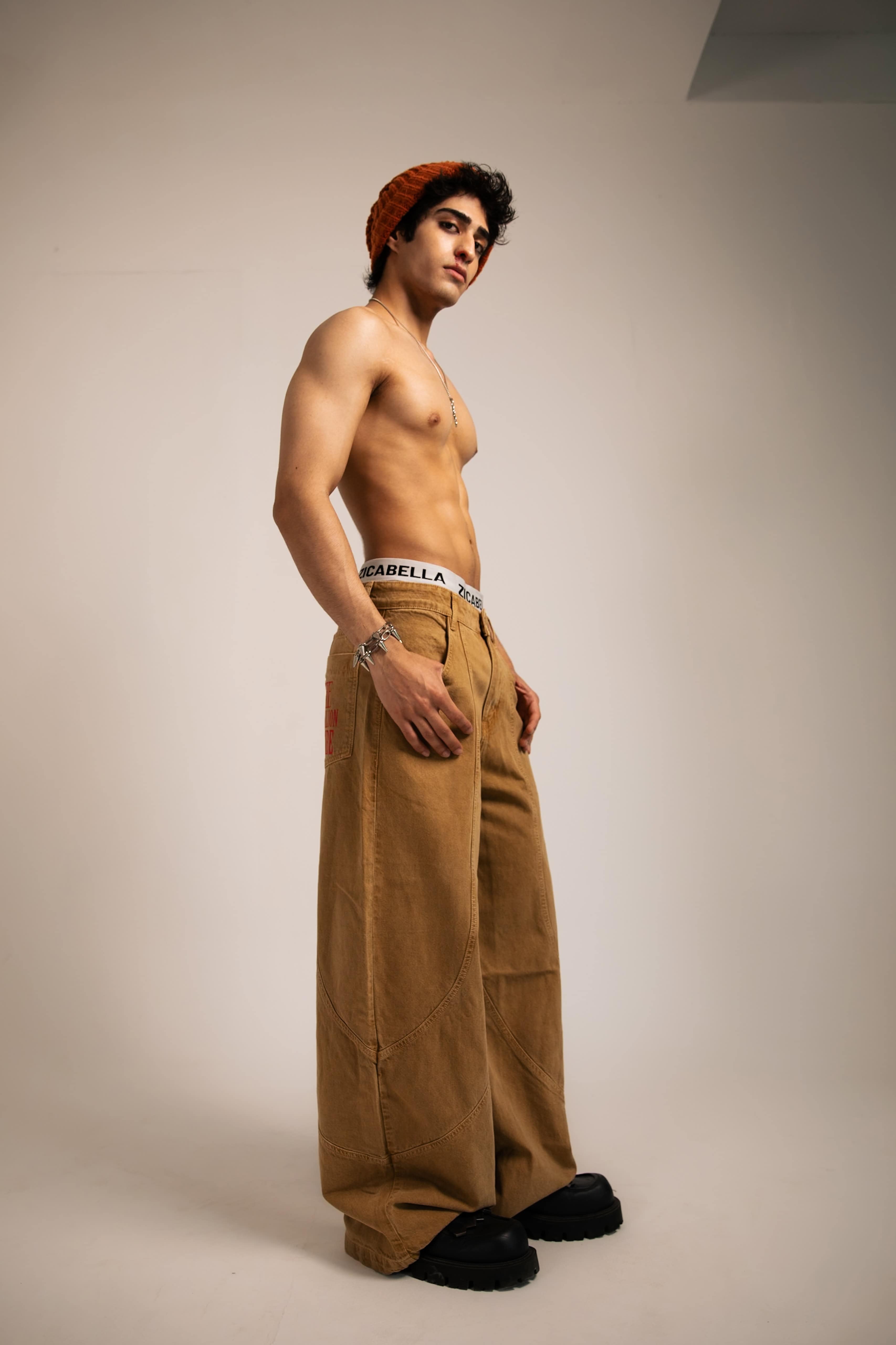 Loose fit beige cotton jeans, crafted for a stylish streetwear look