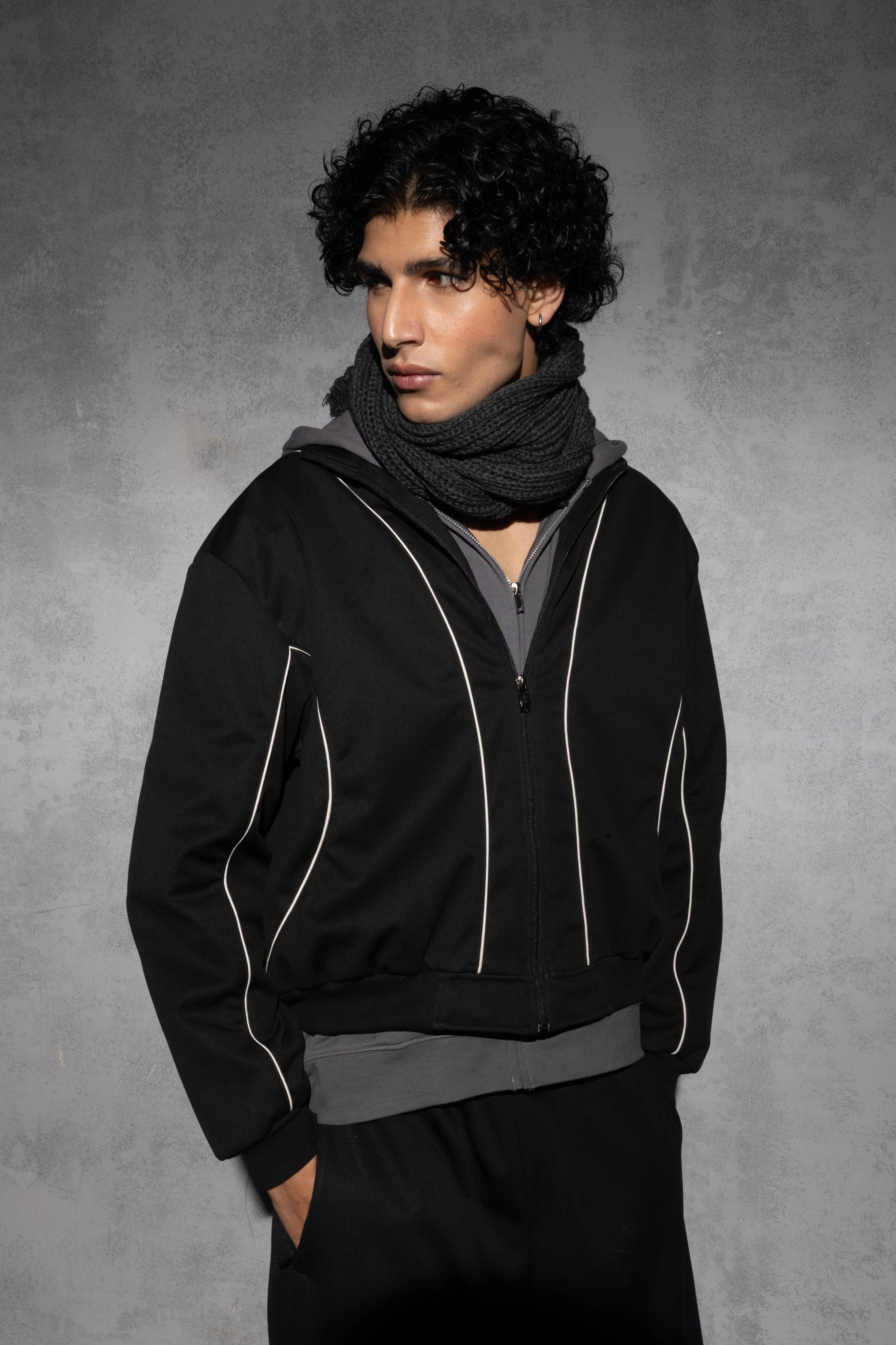 Minimal black oversized men’s tracksuit with relaxed silhouette