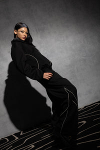 Black oversized men’s tracksuit with bold streetwear look