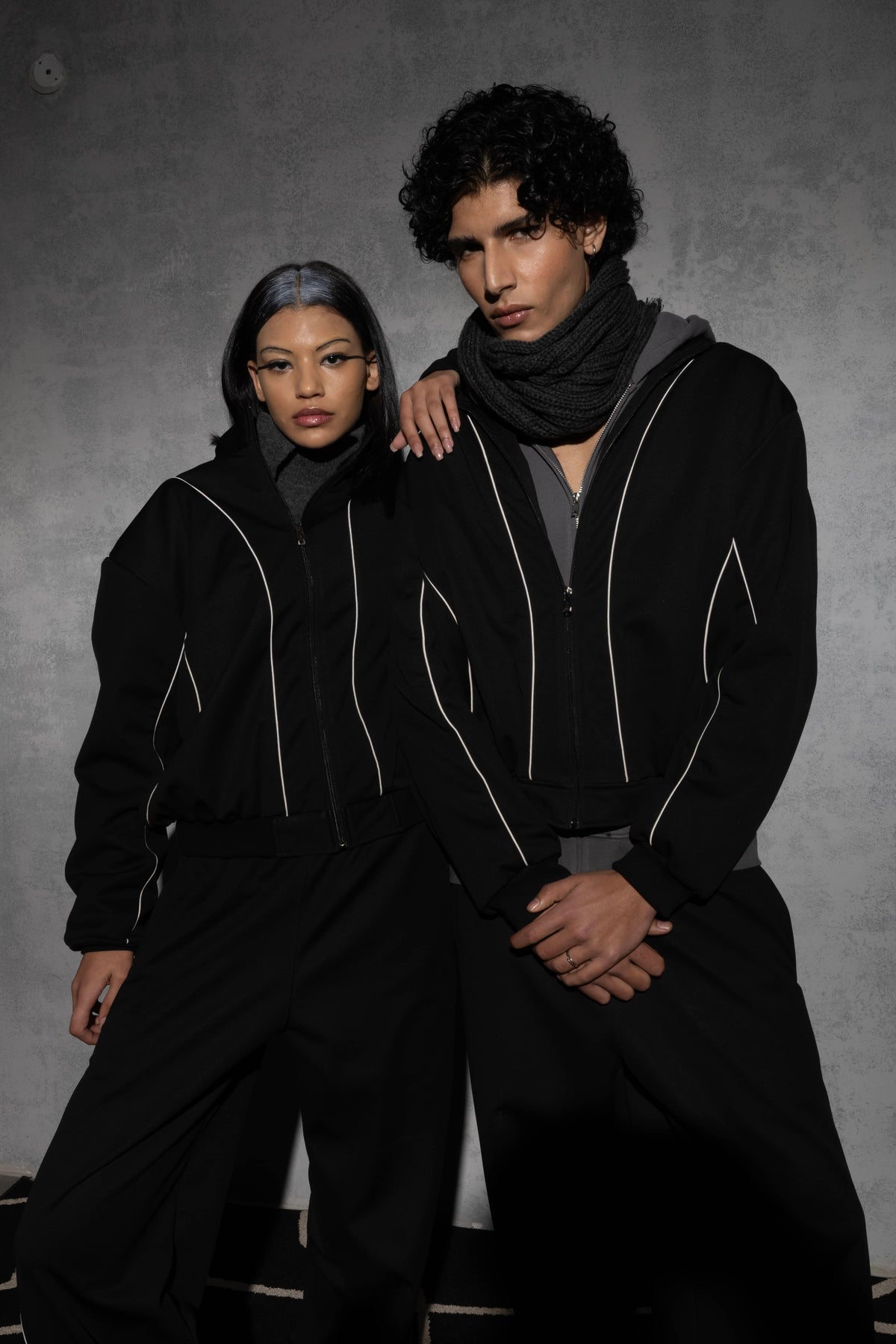 Black oversized tracksuit styled for daily streetwear use