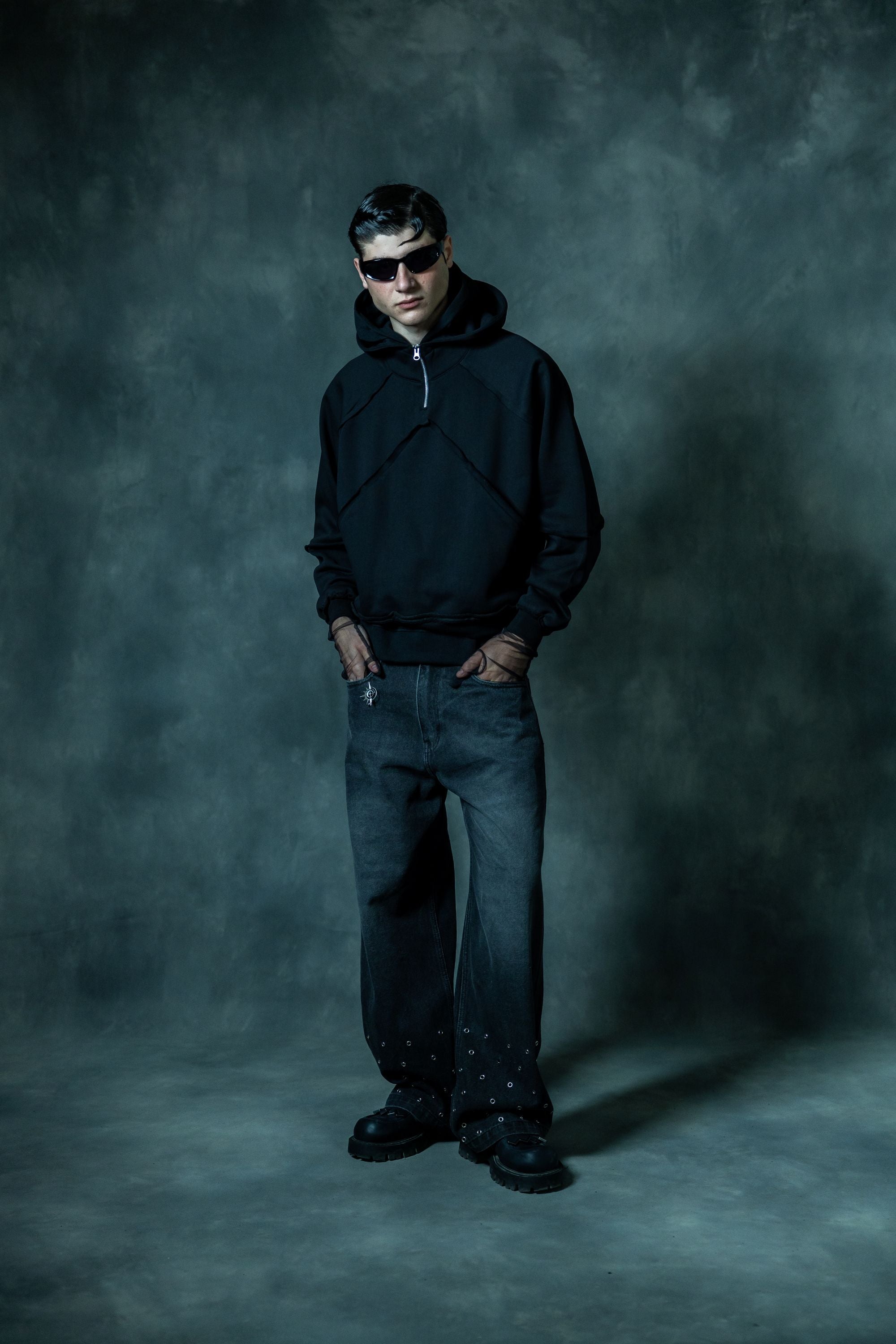 relaxed fit black zip up hoodie outfit, full body streetwear aesthetic with modern minimal styling