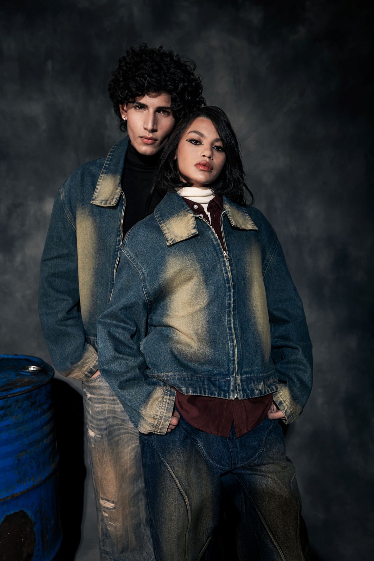 Blue oversized denim jacket with distressed finish for modern streetwear fashion