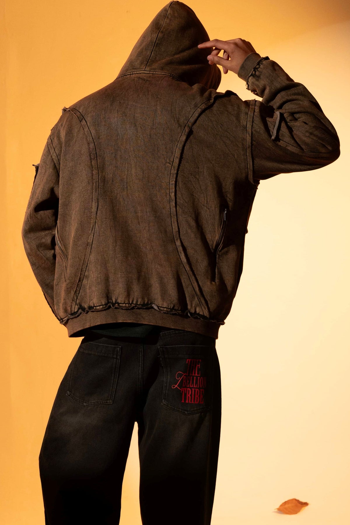 Brown cotton fleece hoodie with raw edge hem and comfortable, easy fit for everyday wear