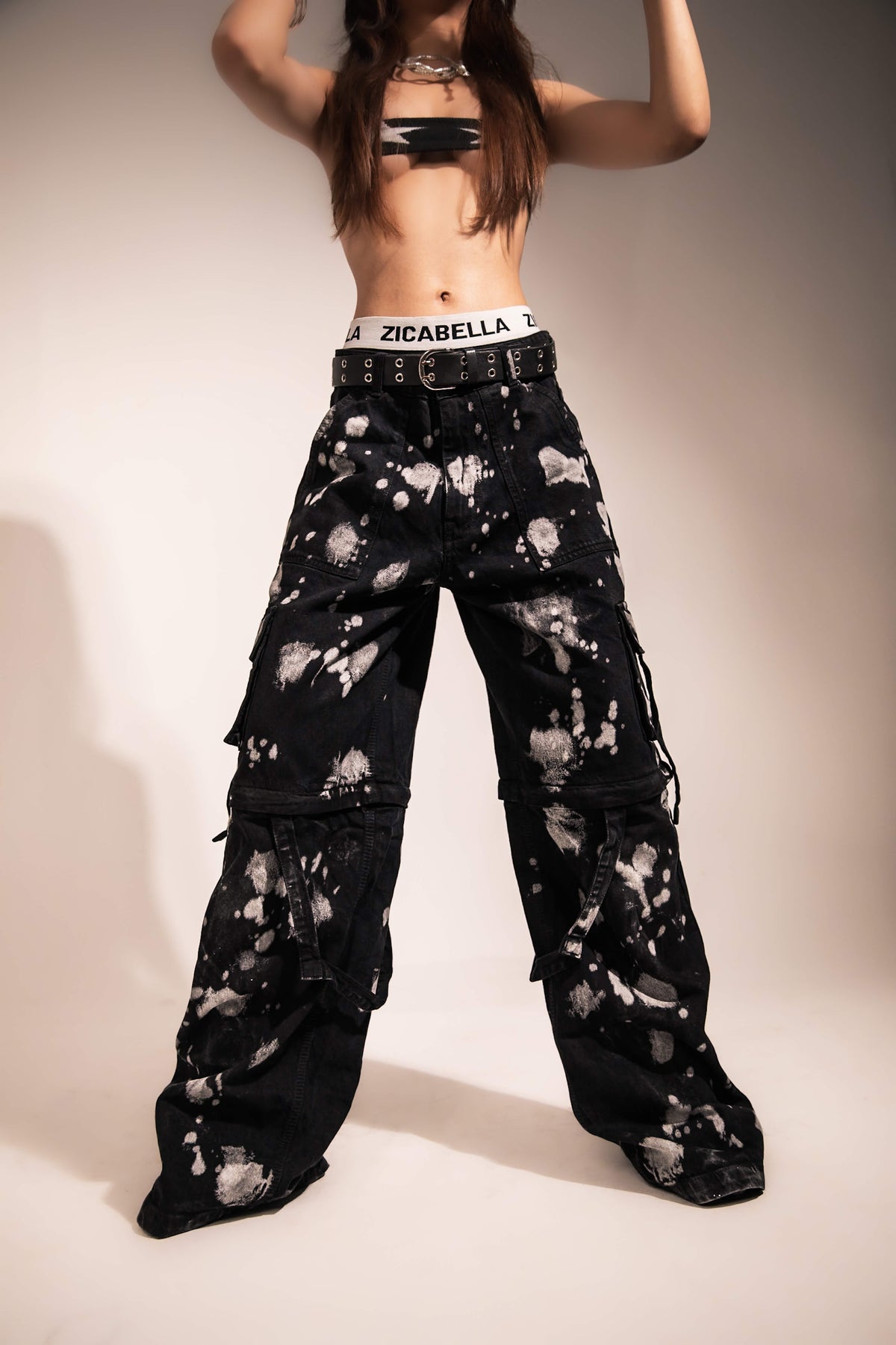 Relaxed fit black denim cargo pants designed for modern urban streetwear