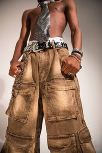 premium baggy brown denim cargo pants with structured side pockets and a heavyweight streetwear drape