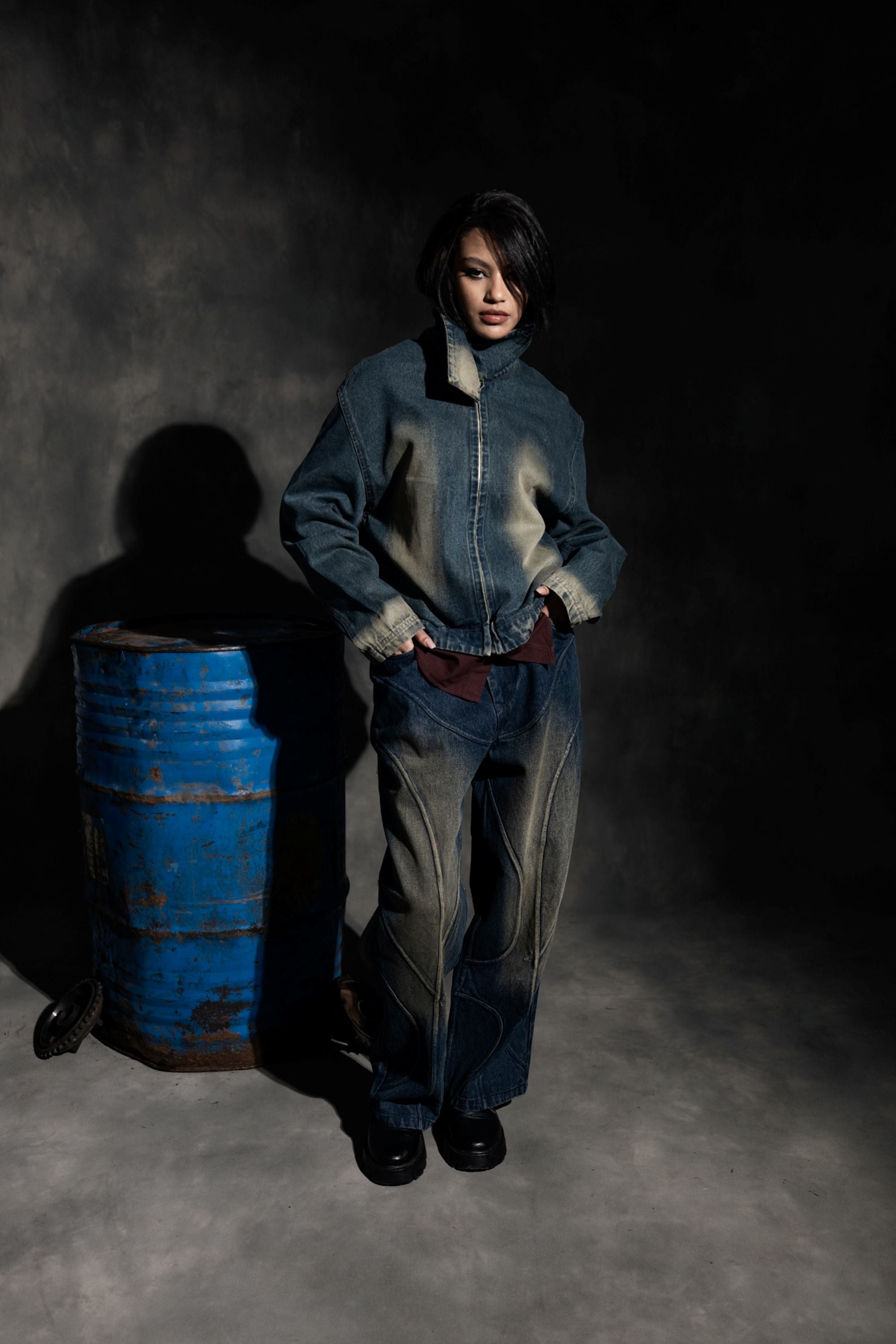 Front view of blue denim jacket with clean structure and streetwear appeal