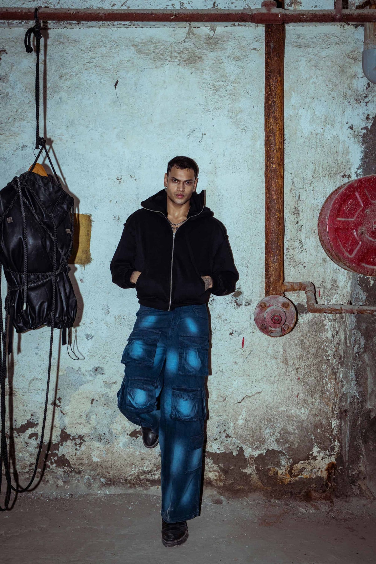 Sleek designer black cotton hoodie with a casual fit, offering a modern luxury appeal