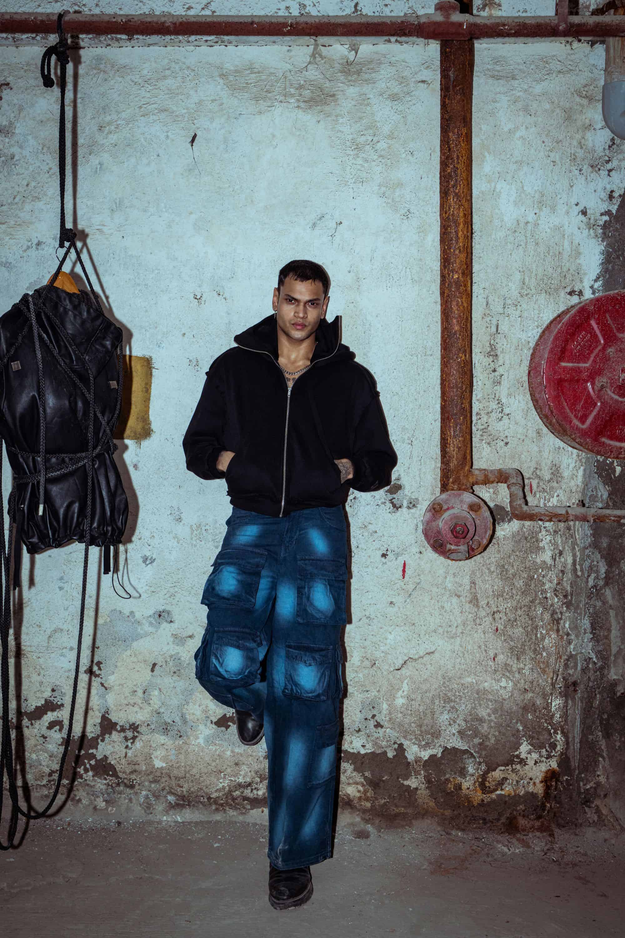 Sleek designer black cotton hoodie with a casual fit, offering a modern luxury appeal