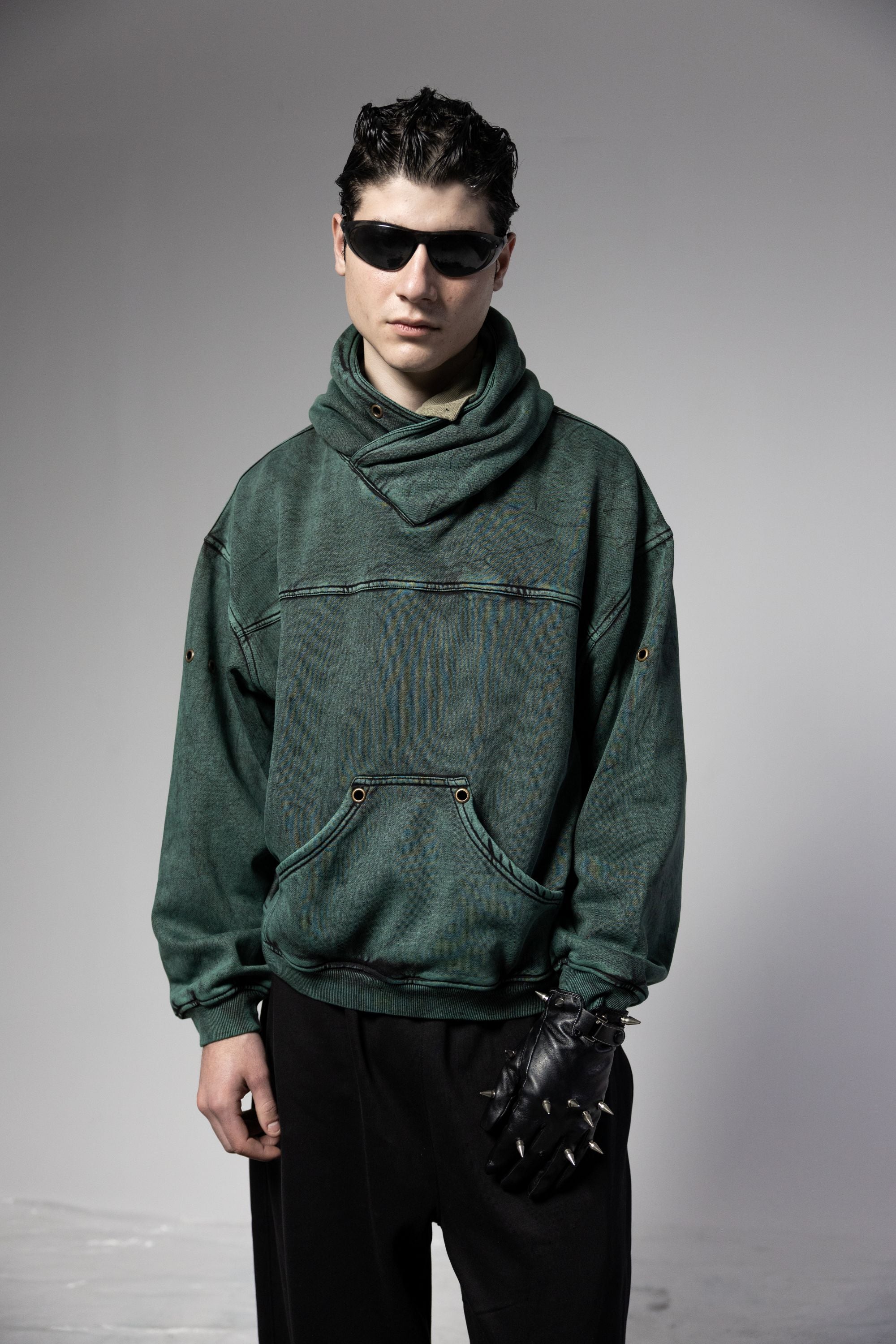 oversized green hoodie with cotton fleece fabric and relaxed streetwear fit