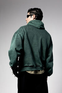 Green streetwear hoodie with clean back design and modern oversized construction