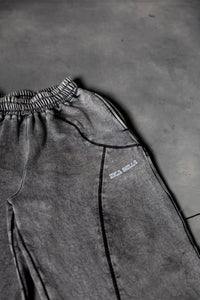 Close up stitching detail of grey baggy lower showcasing clean finish and quality build