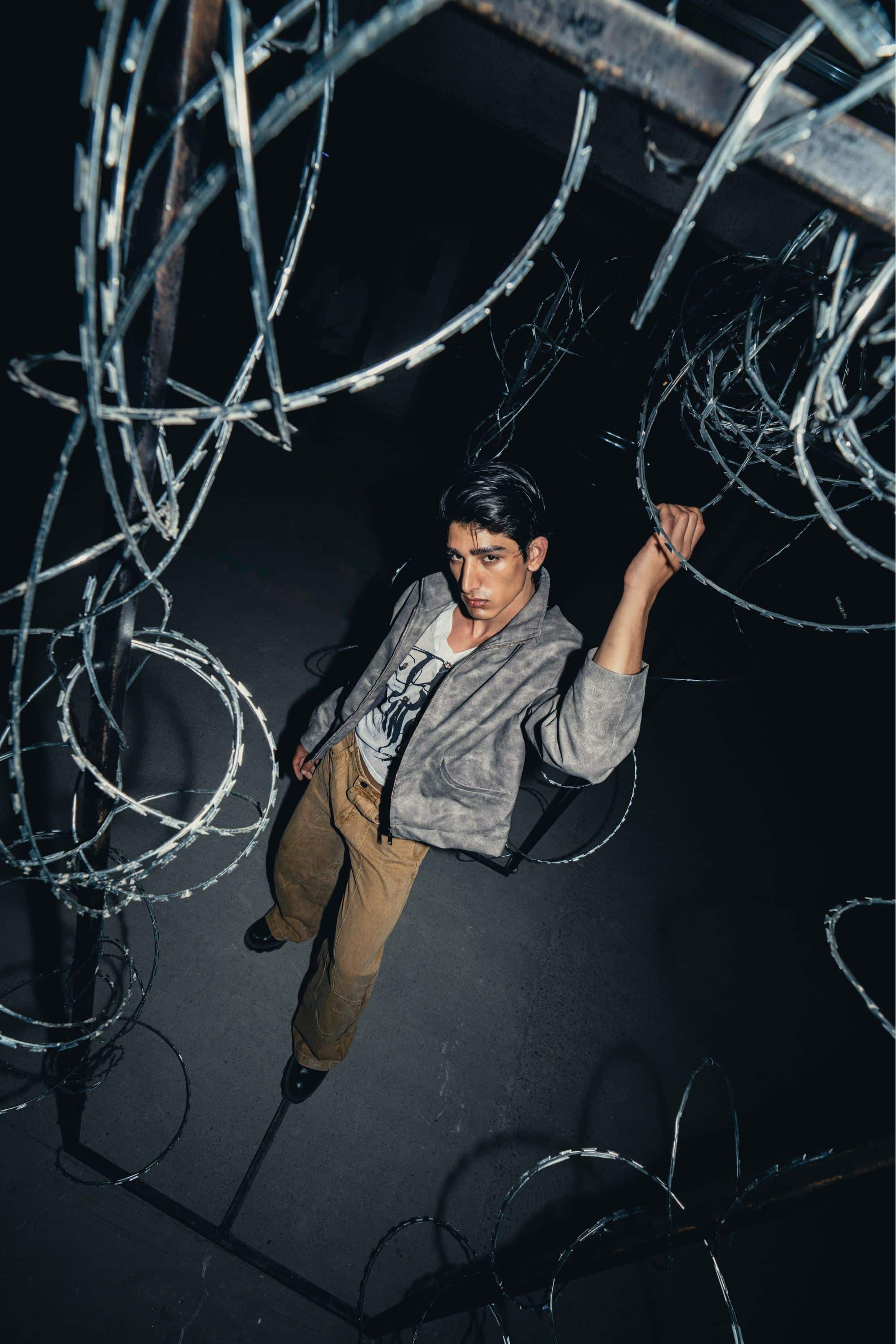 Chic grey leather jacket, crafted from high-quality premium leather, showcasing an oversized fit and streetwear vibe for a stylish urban look