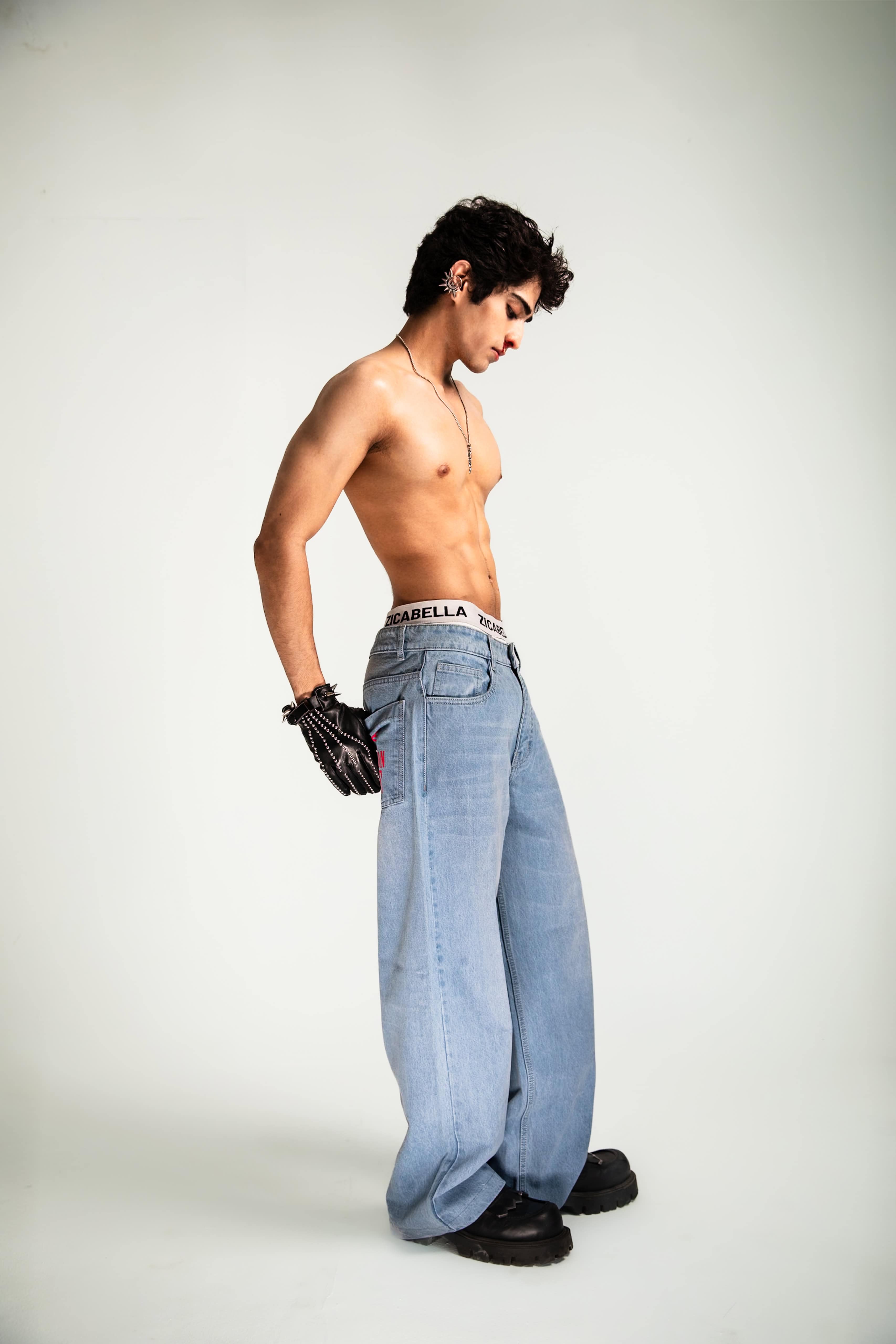 Jeans crafted in denim with a baggy fit and streetwear silhouette delivering a premium drape and clean oversized structure