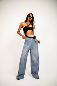 Jeans tailored in denim with a baggy fit and structured build balancing volume with controlled premium drape