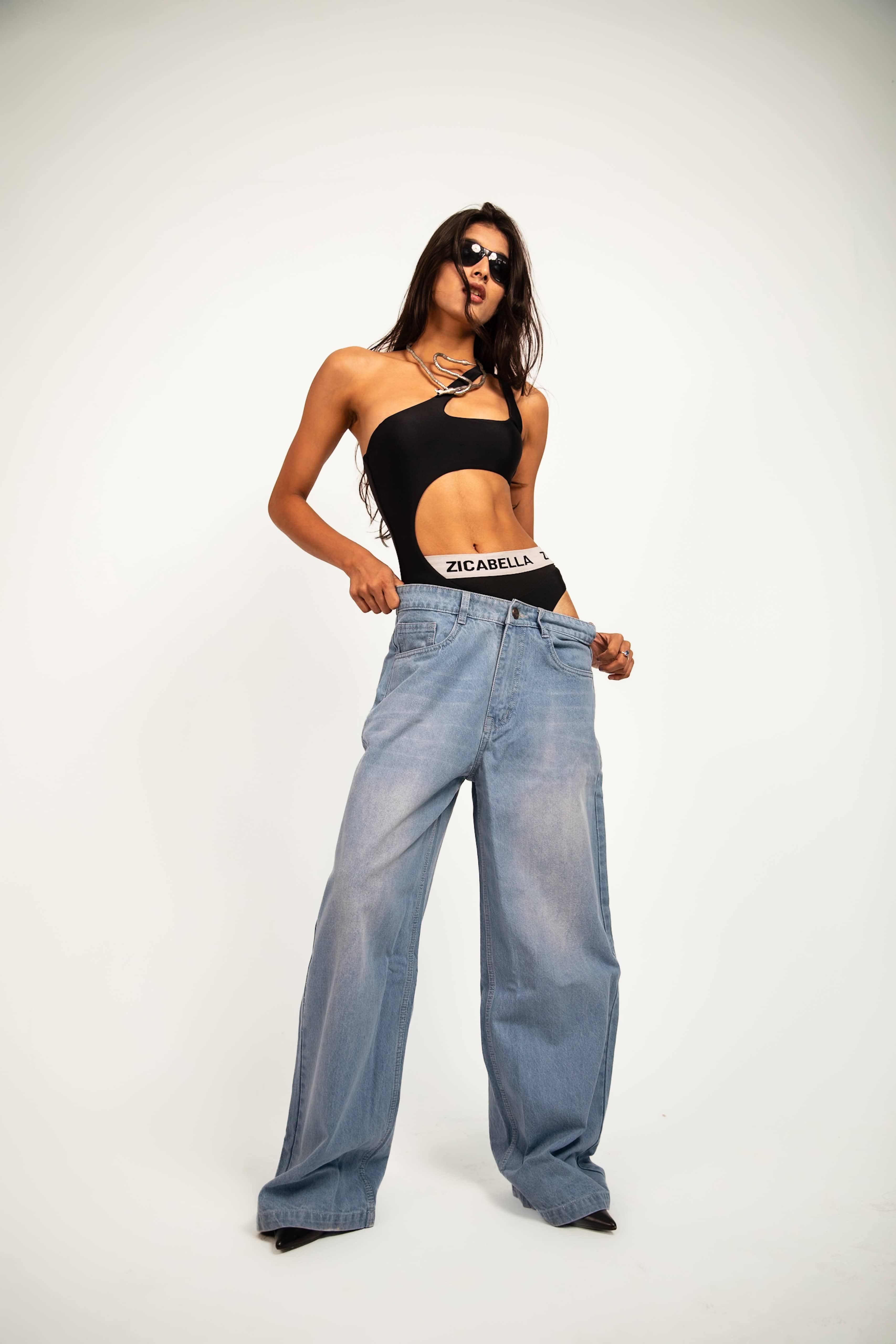 Jeans tailored in denim with a baggy fit and structured build balancing volume with controlled premium drape