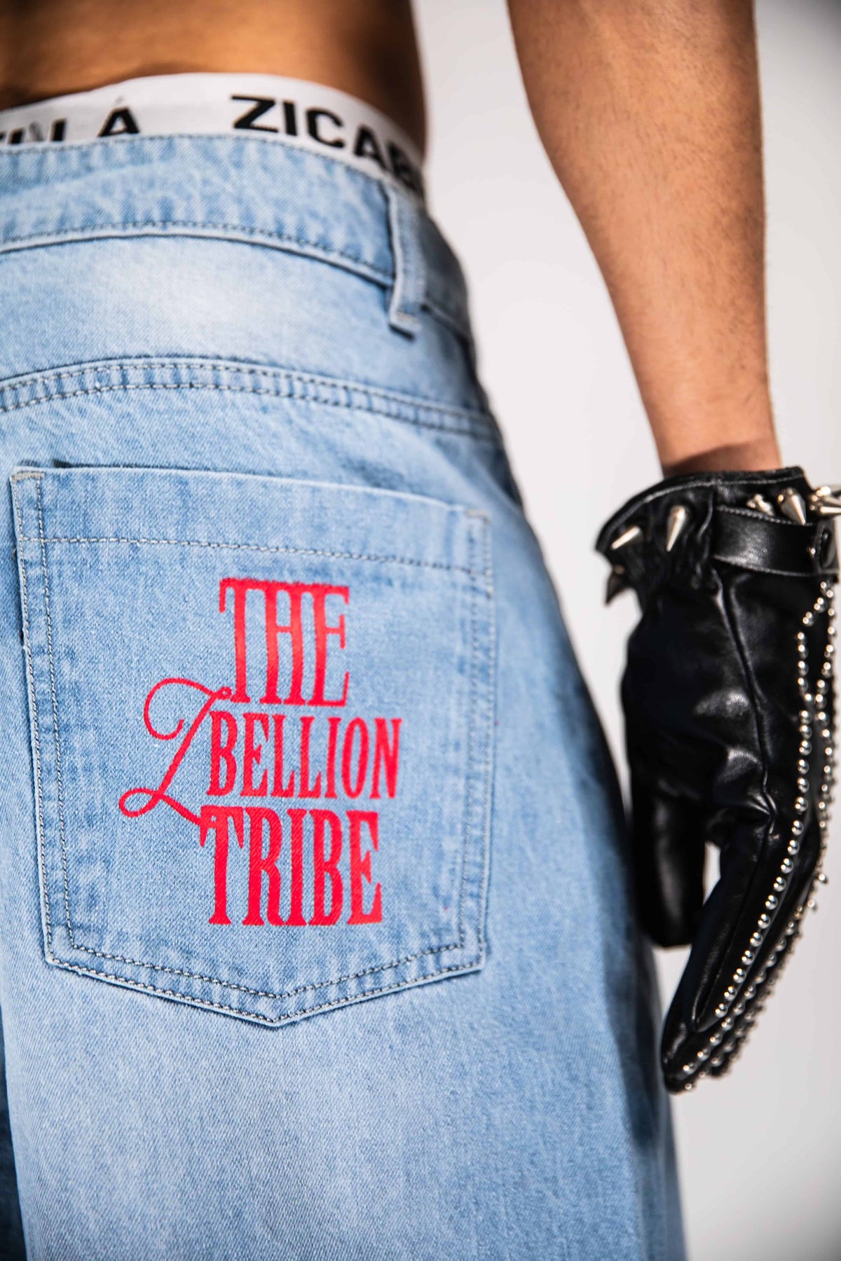 Jeans built from denim with a baggy fit and textured surface creating depth and modern streetwear balance