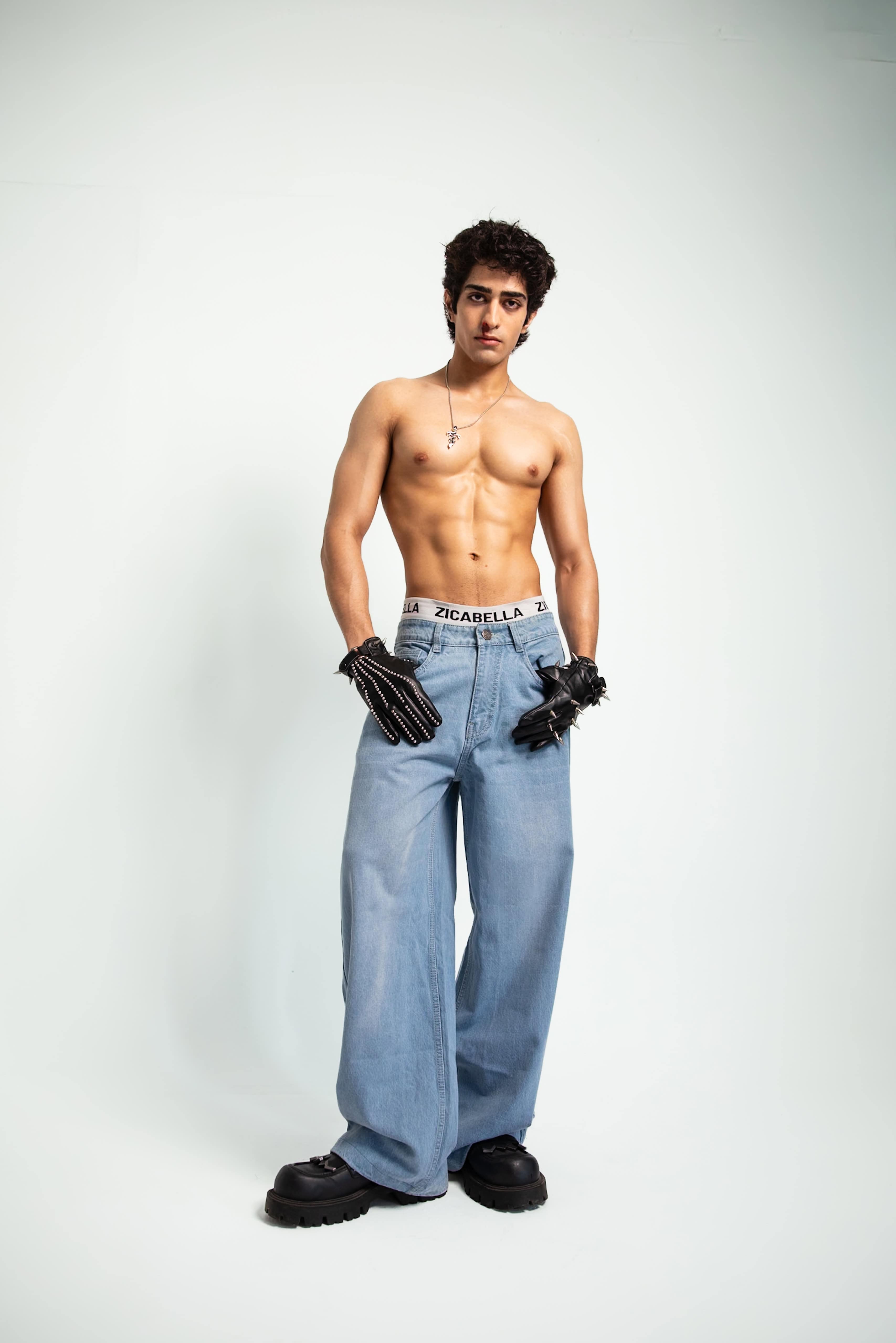 Jeans shaped in denim with a minimal streetwear profile maintaining clean structure and effortless oversized flow