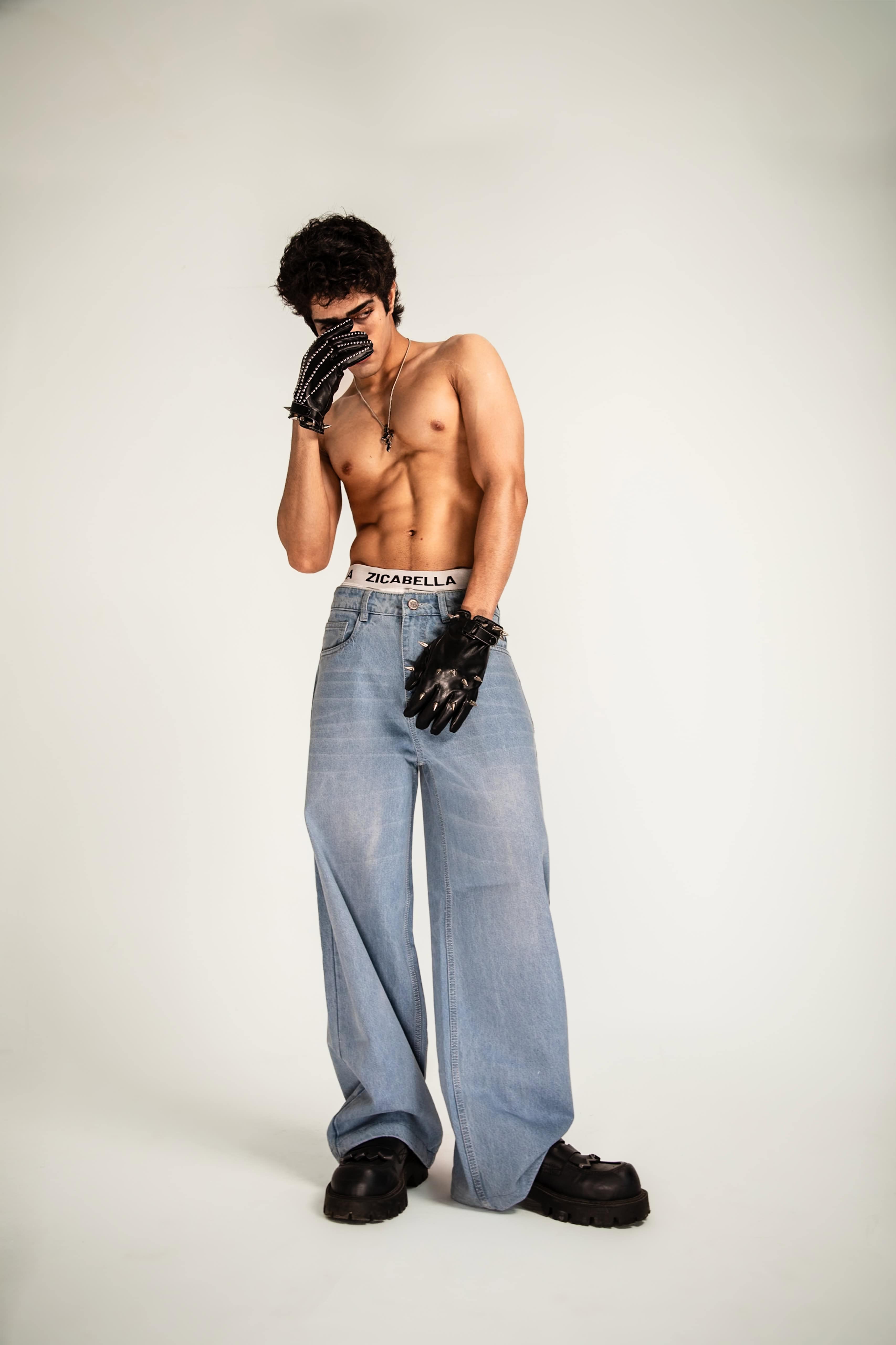 Jeans designed in denim with a structured fit and minimal aesthetic maintaining a premium drape and sharp oversized profile