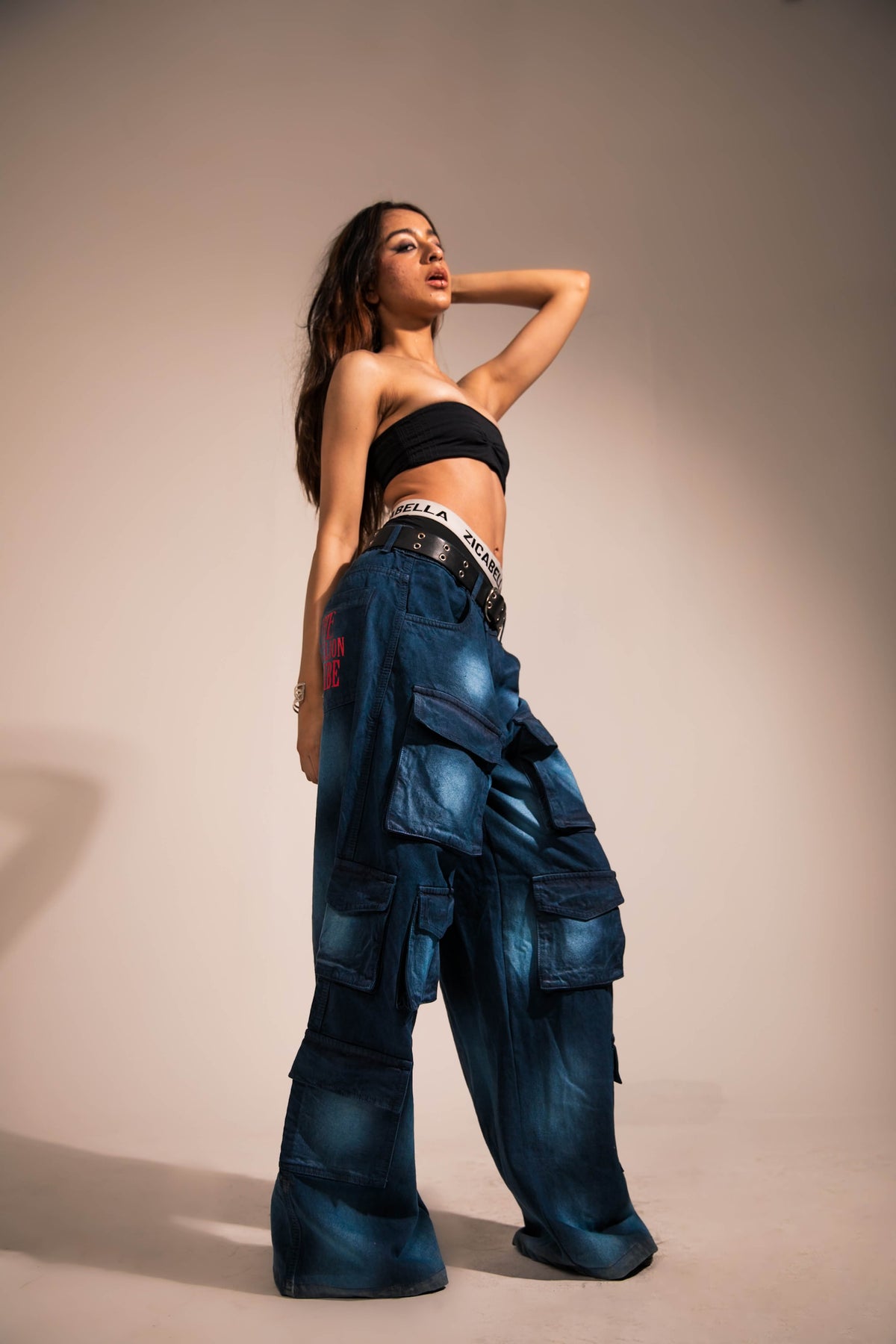 premium dark blue denim jeans with baggy streetwear aesthetic and baggy fit