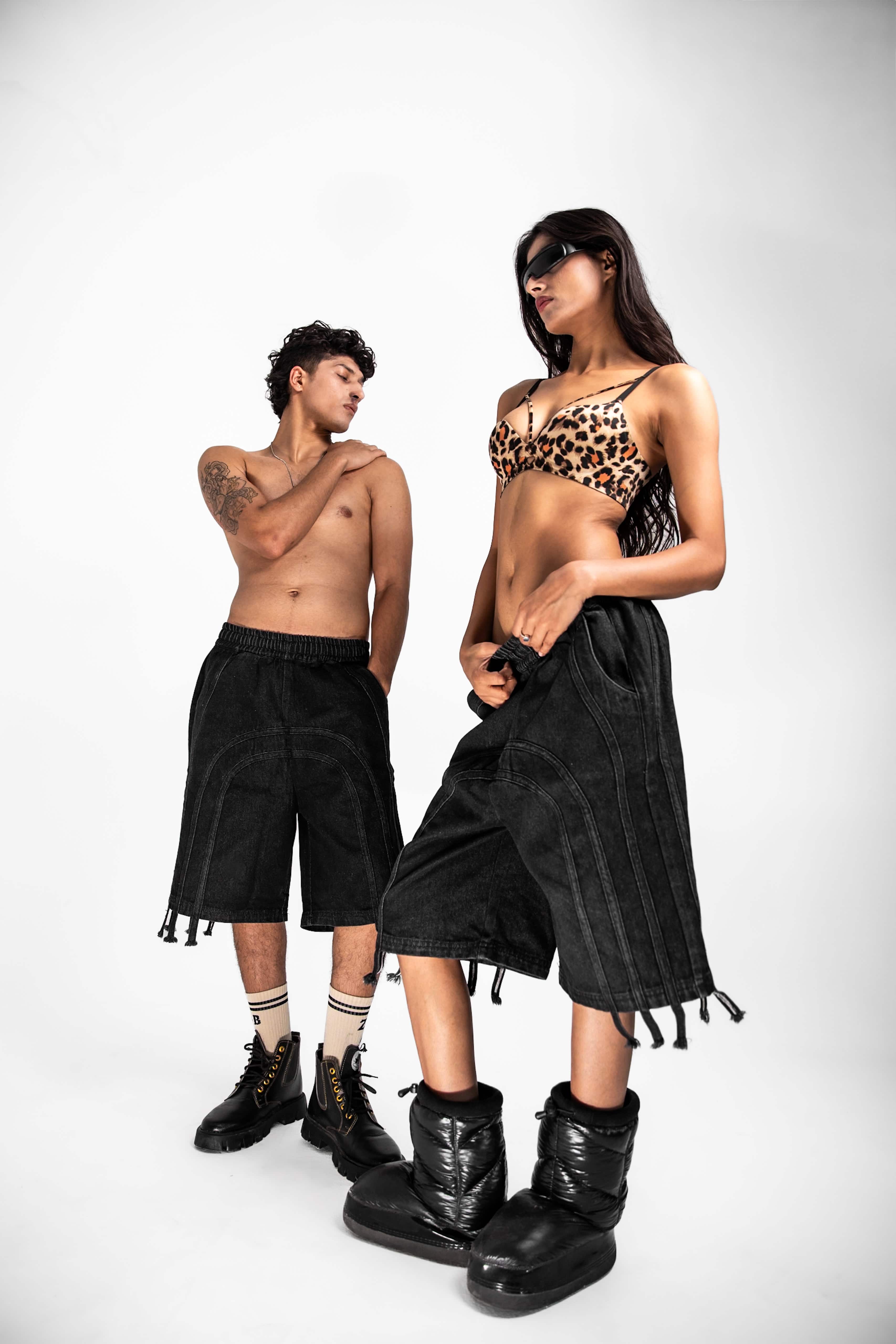 Side angle of jorts showing fringed detail, ideal for urban streetwear