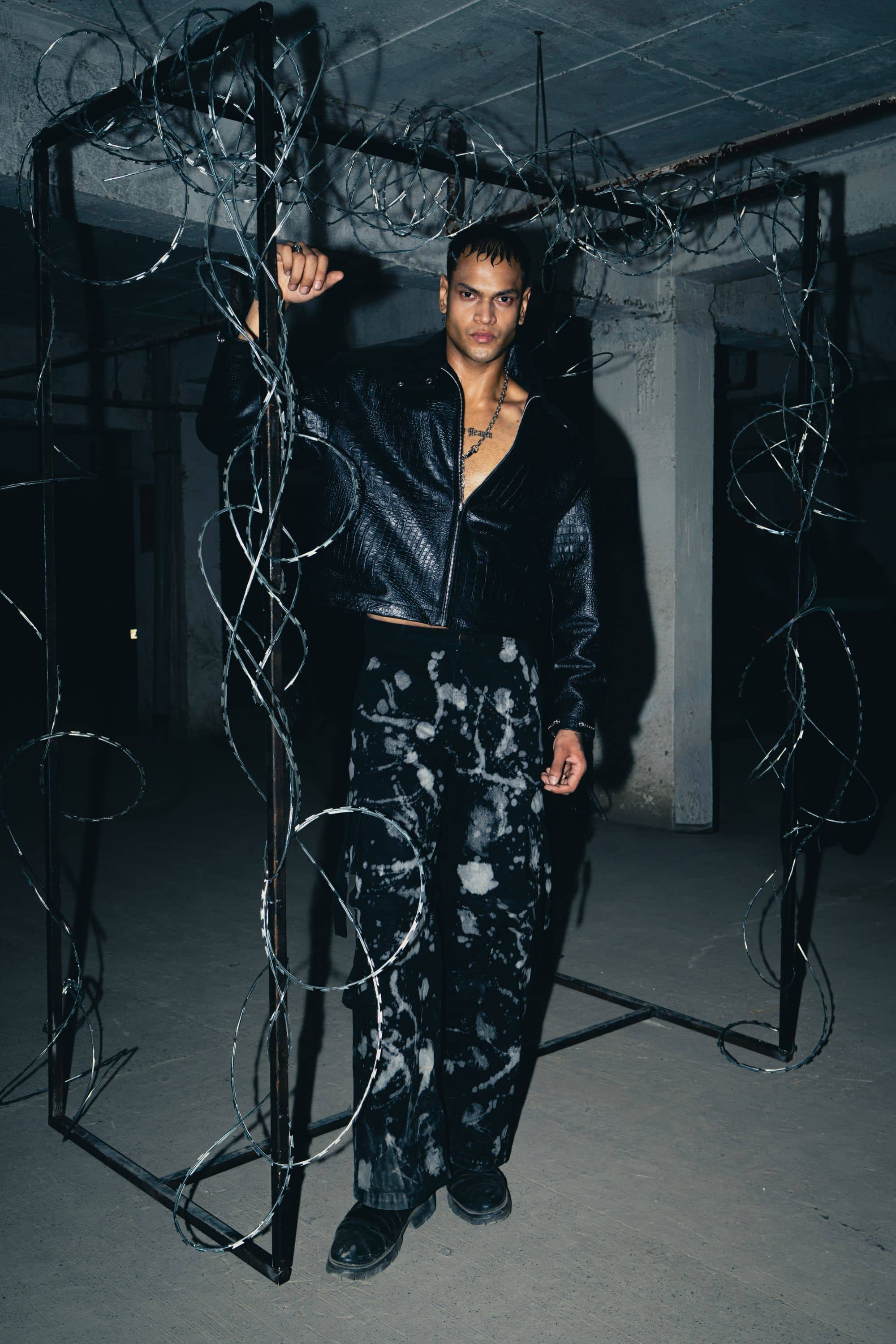 Modern oversized black croc leather jacket, offering a chic and stylish appearance for streetwear lovers