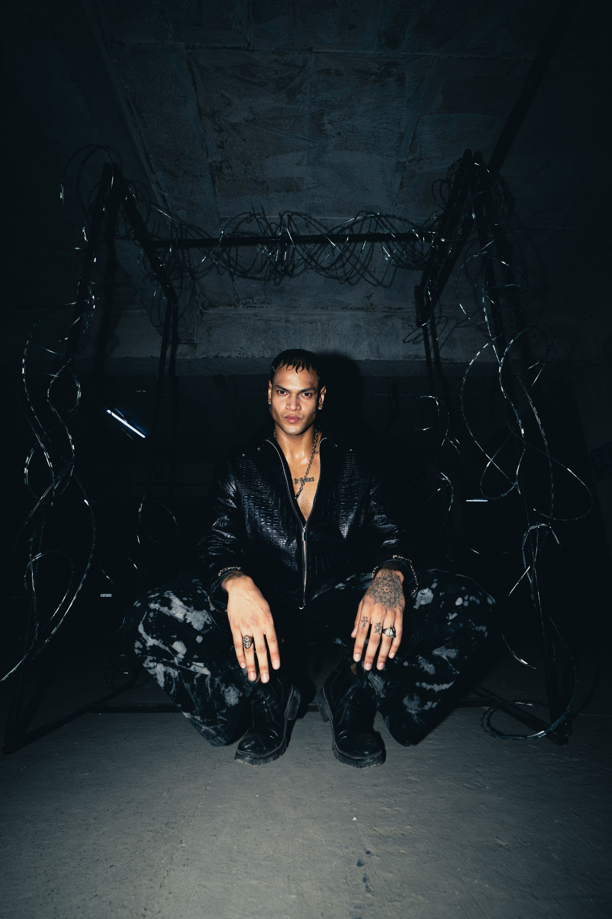 Streetwear inspired relaxed fit black croc leather jacket, designed for a comfortable and stylish fit