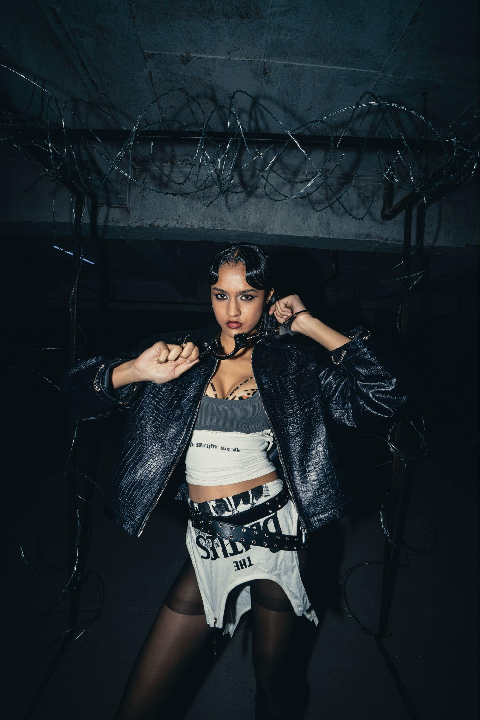 Structured oversized black croc leather jacket, combining bold design with a relaxed, comfortable fit