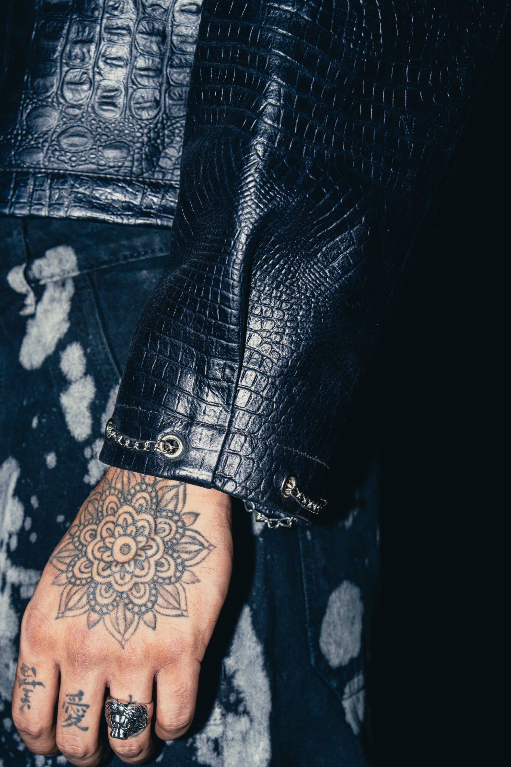 Structured black jacket crafted from high-quality leather for a sharp, modern look