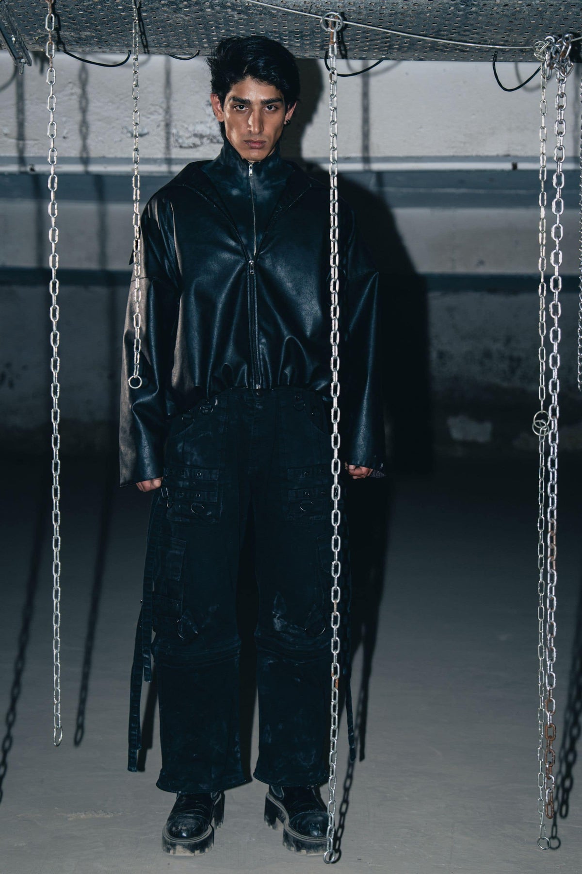 leather biker jacket in black, featuring a textured finish and relaxed fit for a sleek, bold look