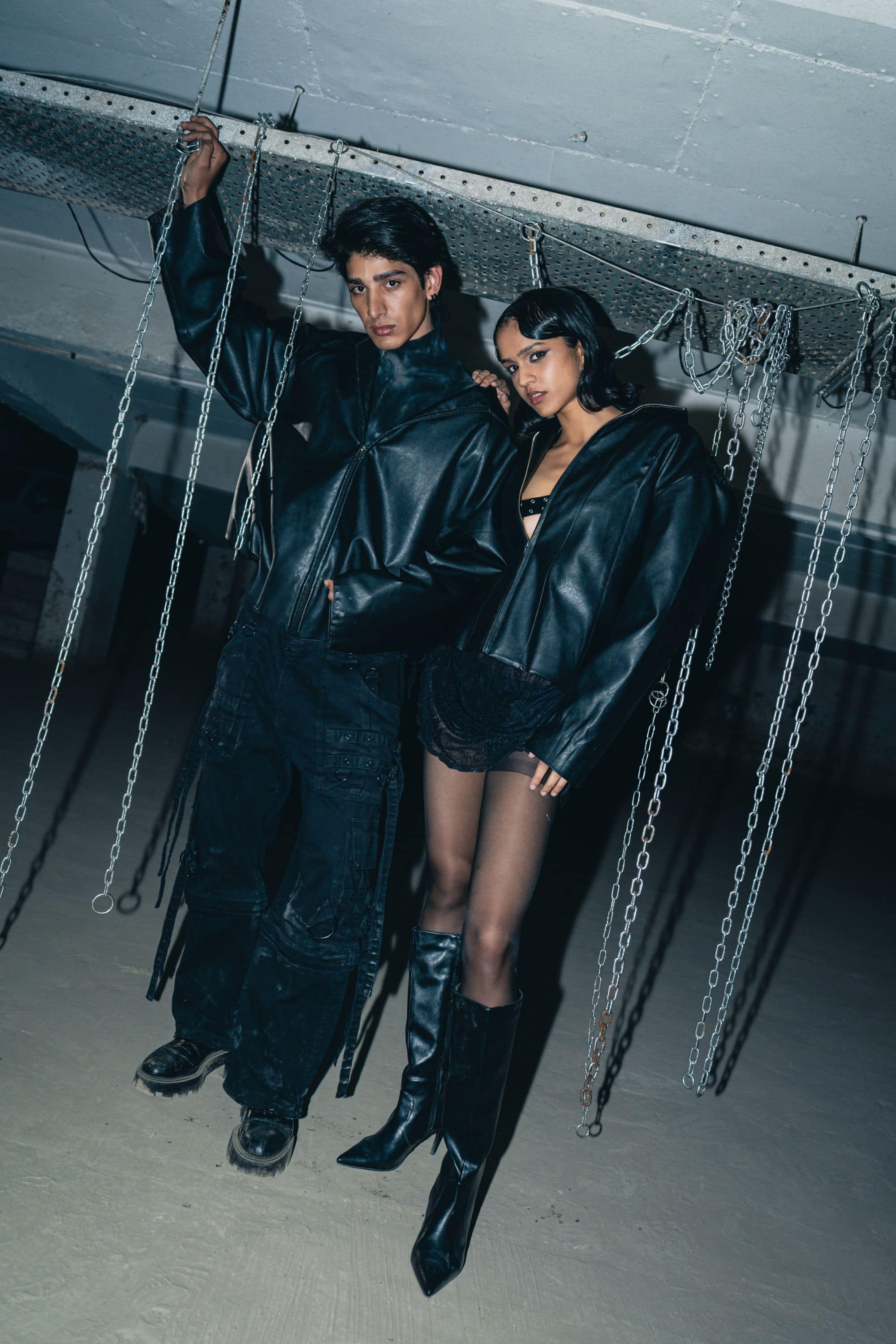 Washed black leather jacket with a fine finish, offering a rugged biker style and relaxed fit