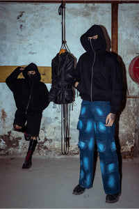 Luxe black cotton hoodie with a textured design and relaxed fit, offering chic street fashion