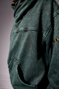 Men’s green hoodie pocket and sleeve construction with durable premium fabric