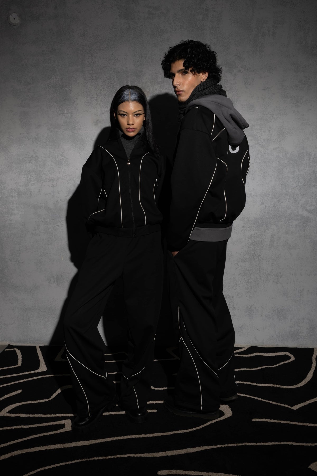 Modern black oversized tracksuit with relaxed silhouette
