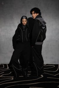 Modern black oversized tracksuit with relaxed silhouette