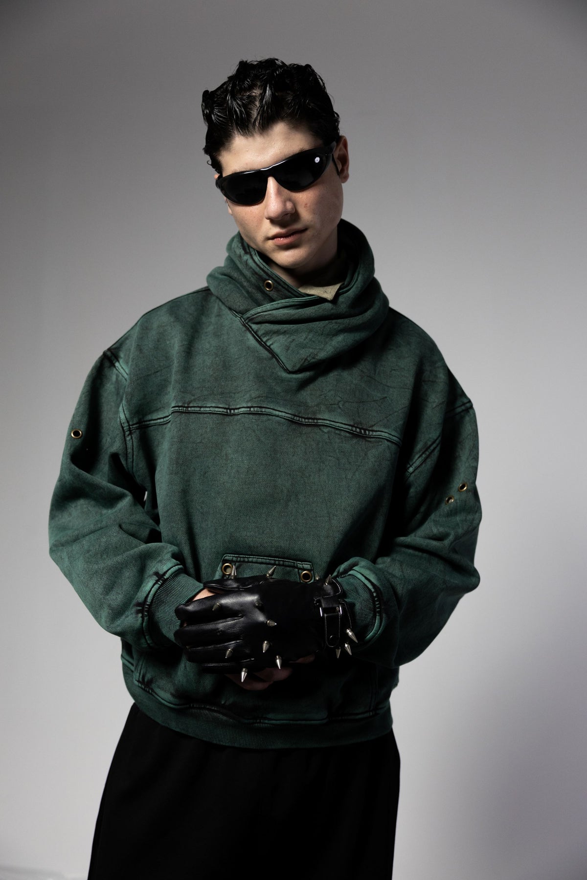 green streetwear hoodie with relaxed oversized fit and modern urban appeal