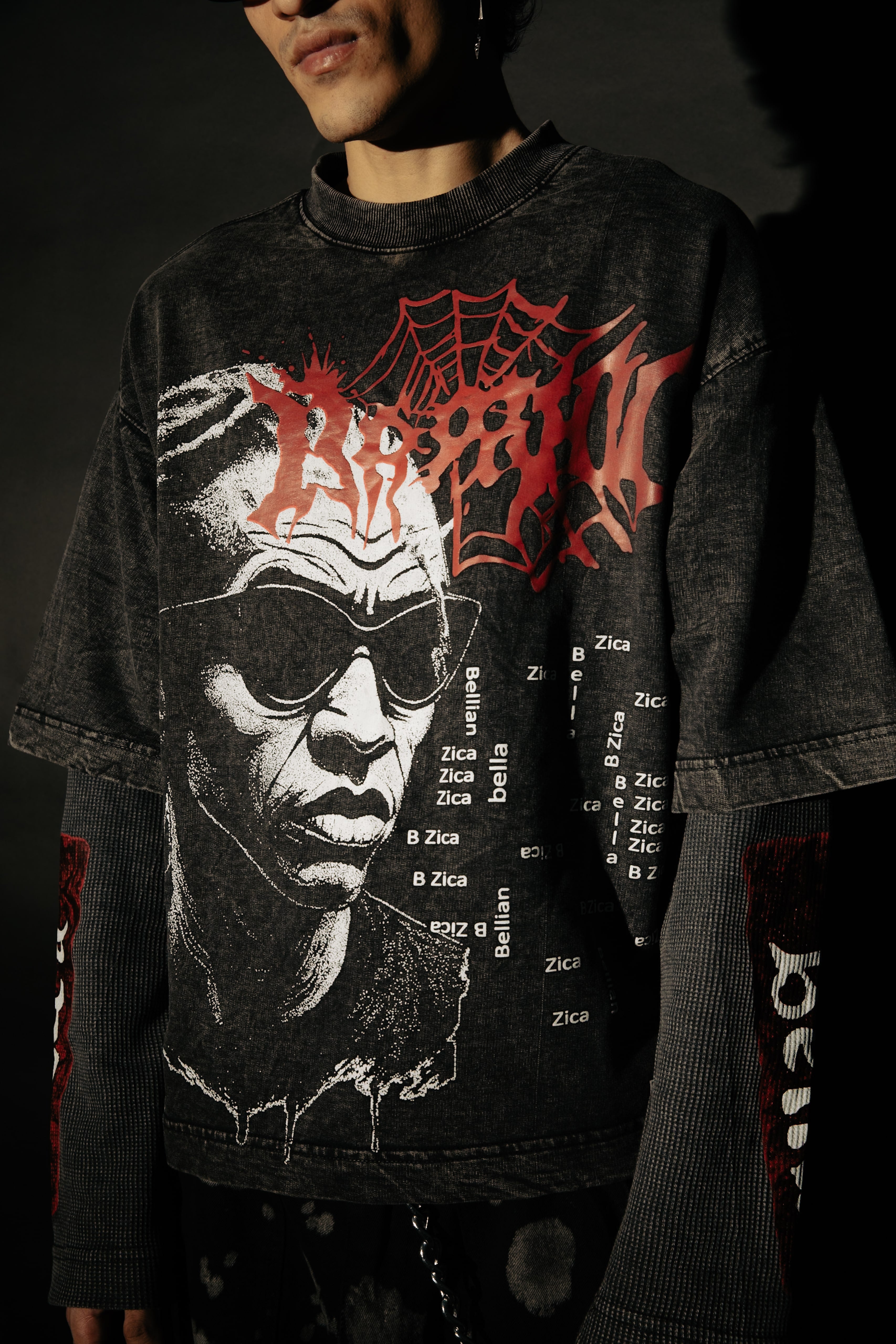 Bold graphic print on an oversized black cotton tee, perfect for casual style