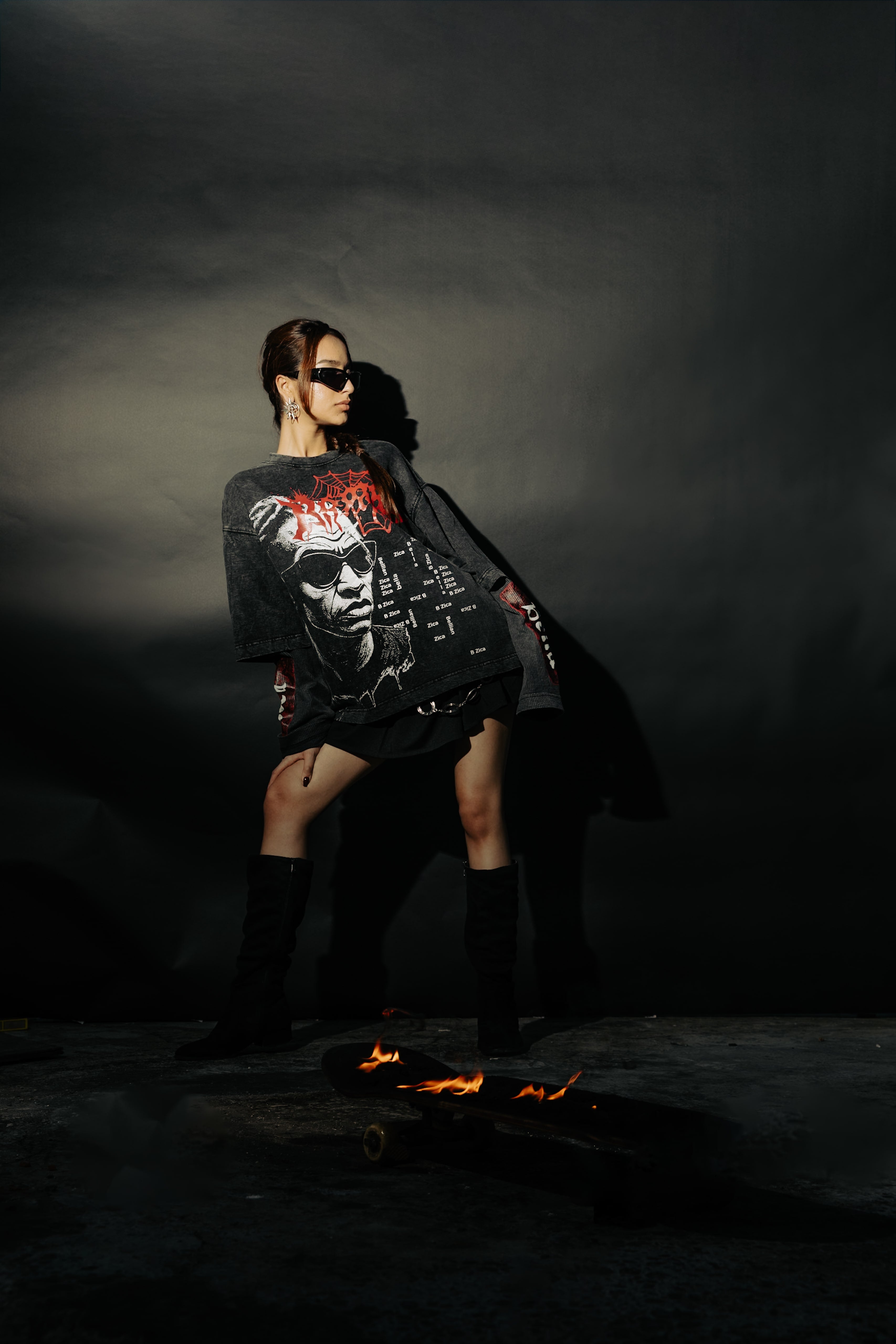 Casual oversized black t-shirt with a relaxed fit and unique graphic print