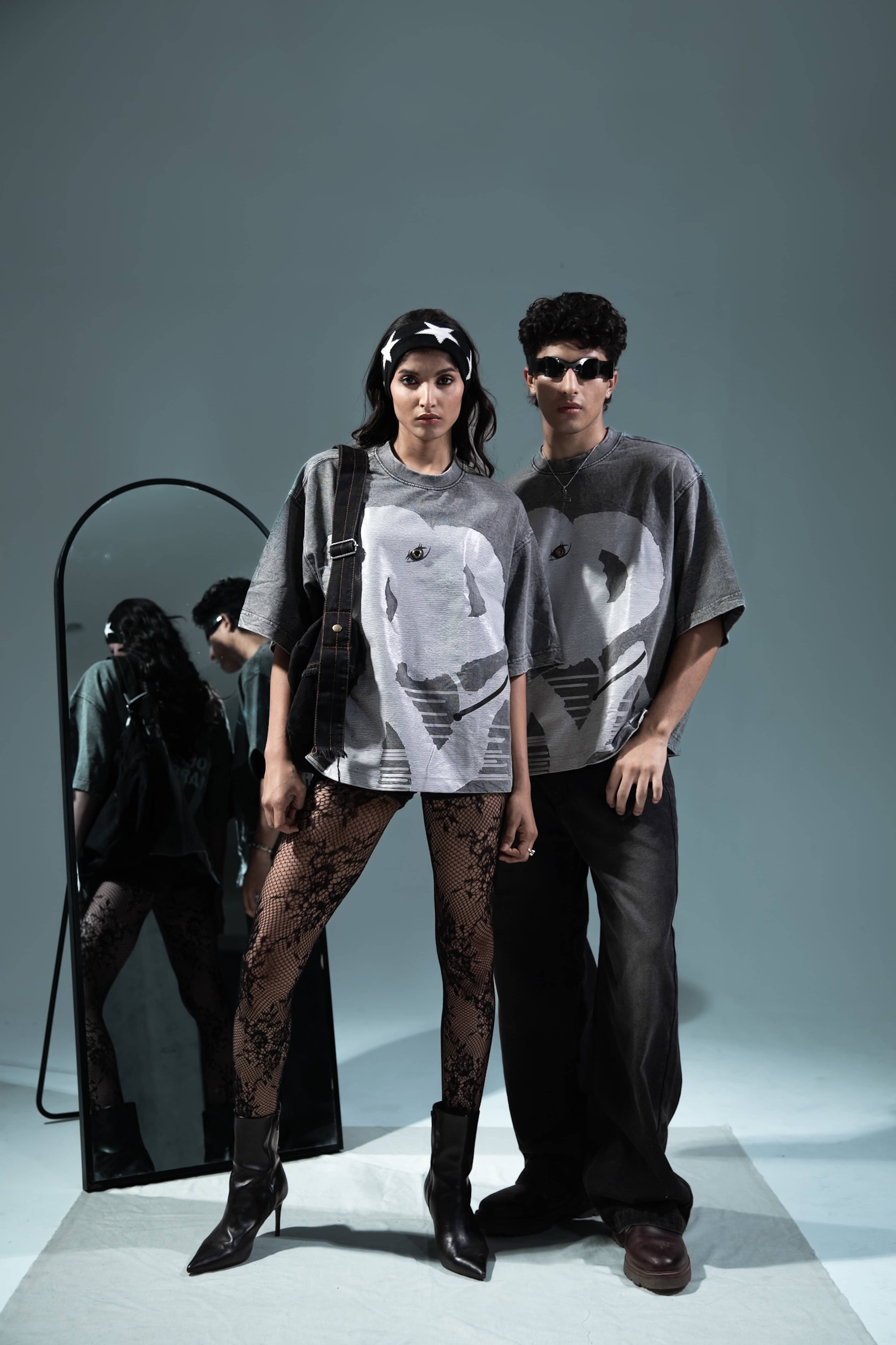 Artsy grey oversized graphic t-shirt, designed to elevate any urban streetwear look