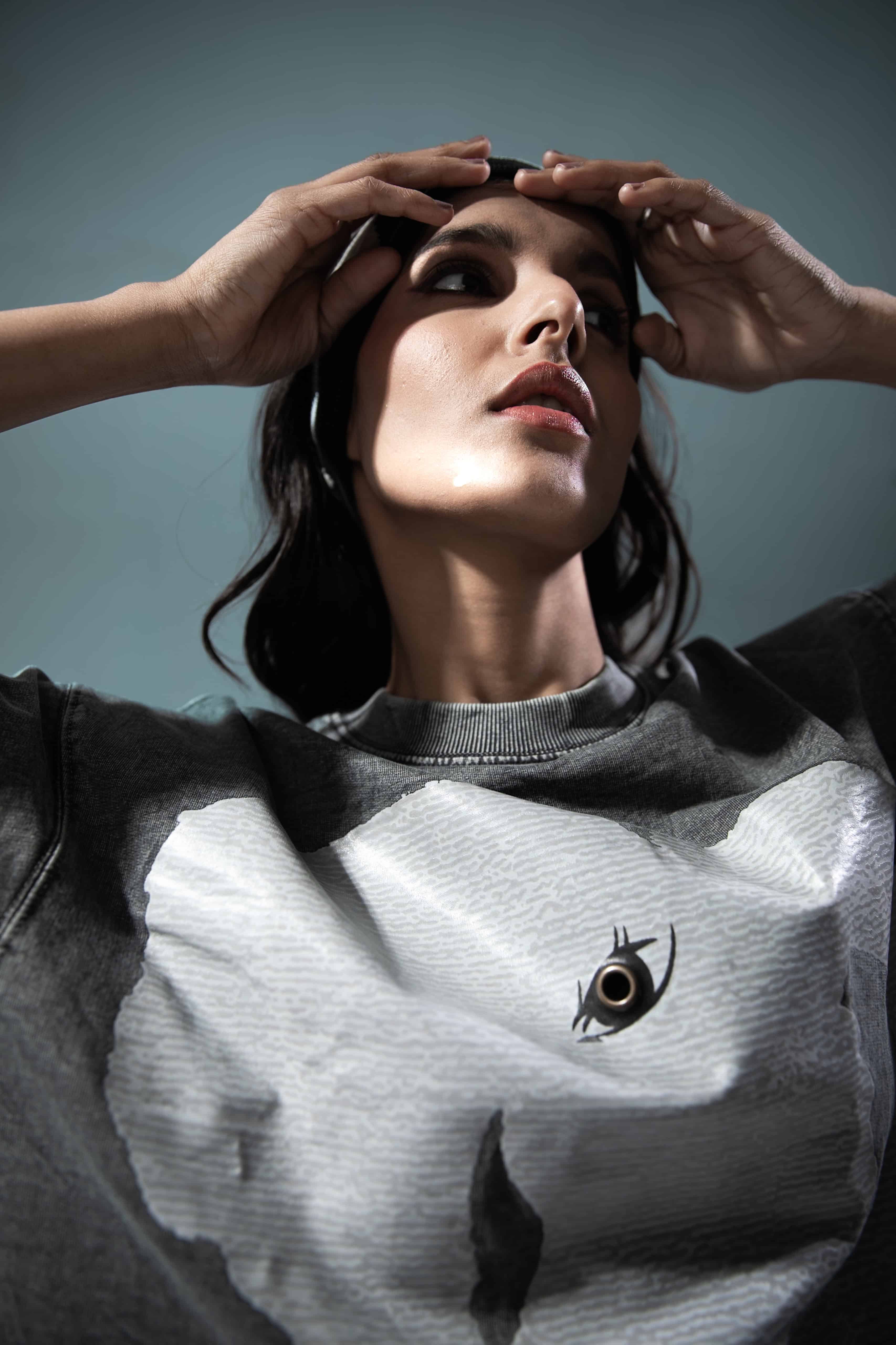 Fashion forward premium oversized grey t-shirt with a bold graphic design, perfect for street fashion