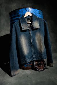 Premium denim jacket product shot highlighting fabric texture and quality