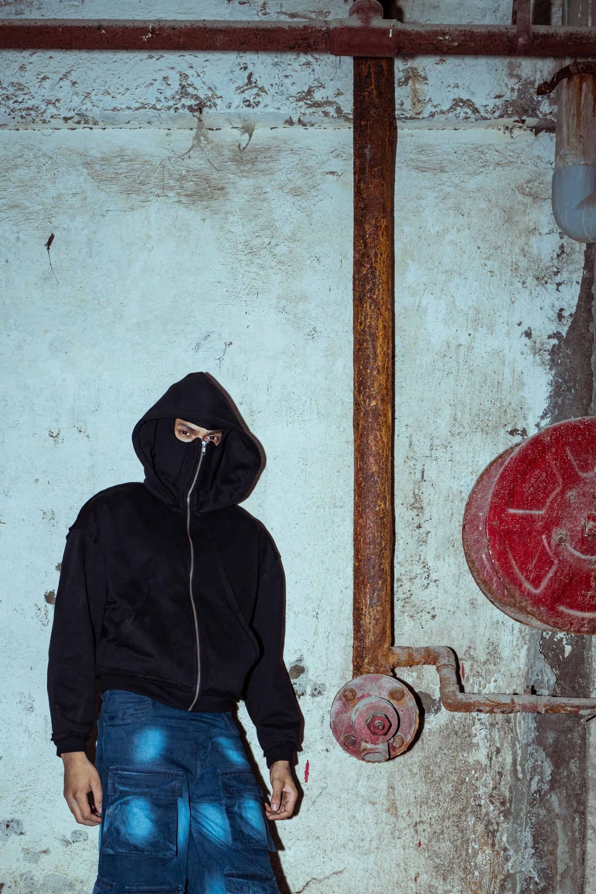 Premium black cotton hoodie with a modern fit, ideal for high-fashion street style