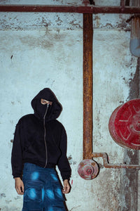 Premium black cotton hoodie with a modern fit, ideal for high-fashion street style