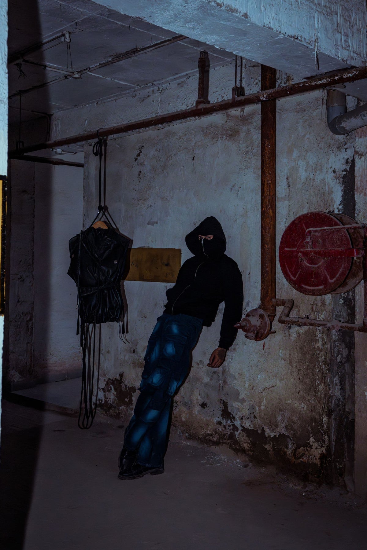 Premium black cotton hoodie with a relaxed fit, ideal for luxurious athleisure style