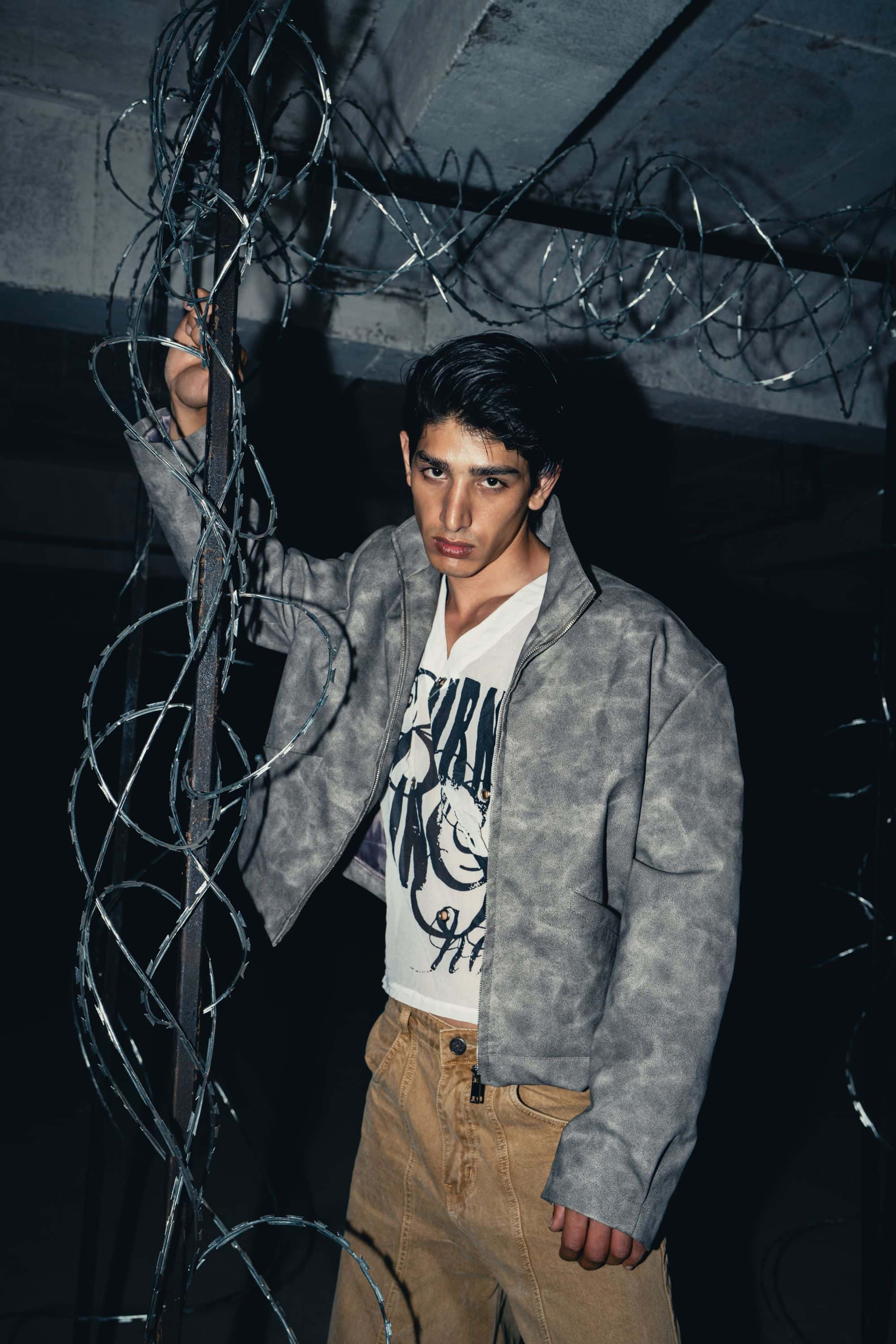 Modern oversized grey leather jacket, crafted from premium leather, designed to elevate streetwear fashion with its fit