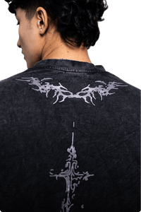 Back view of the premium streetwear graphic t-shirt showcasing detailed print and oversized fit.