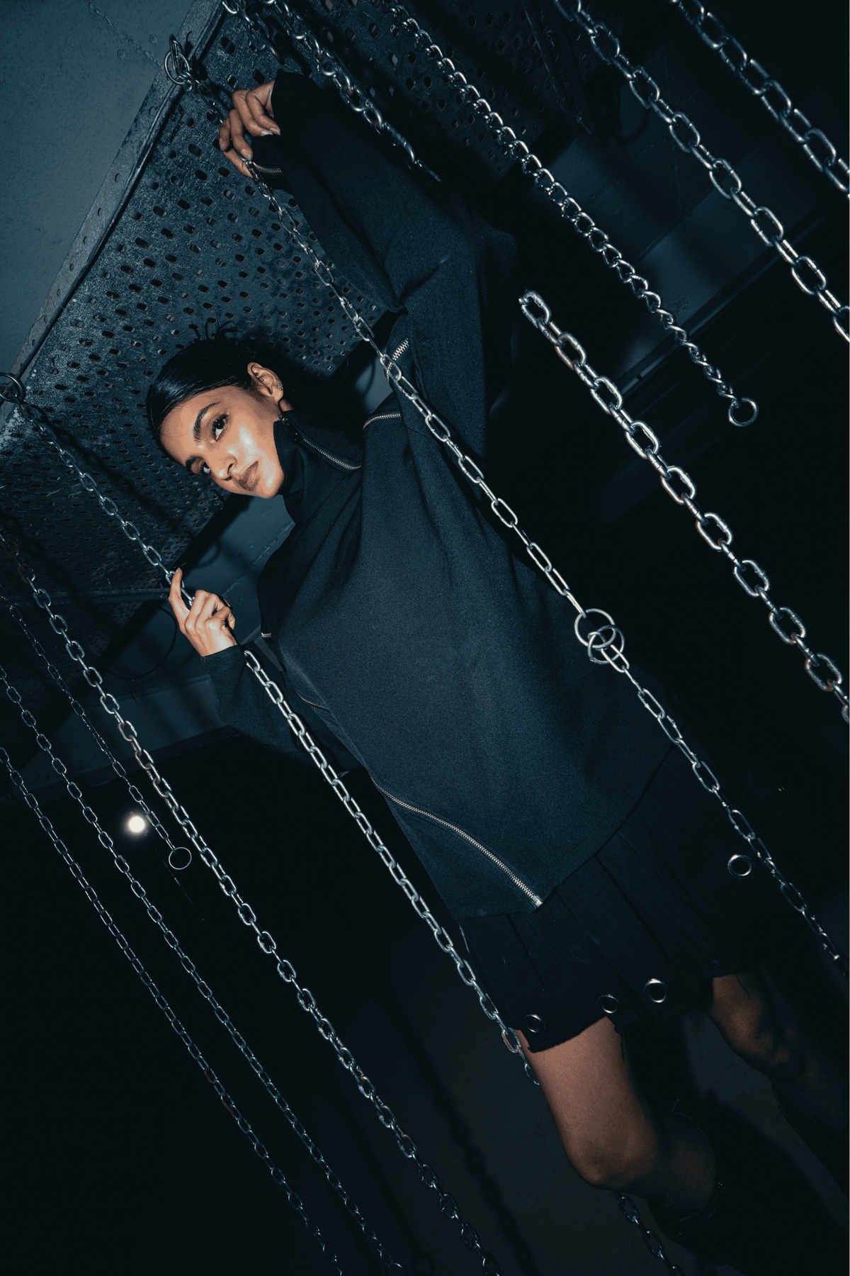 Versatile black oversized shirt with a relaxed fit, ideal for casual or streetwear looks, crafted from eco-friendly materials