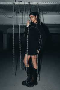 Comfortable black oversized shirt made from banana crepe fabric, perfect for casual wear with a relaxed fit and minimalist design