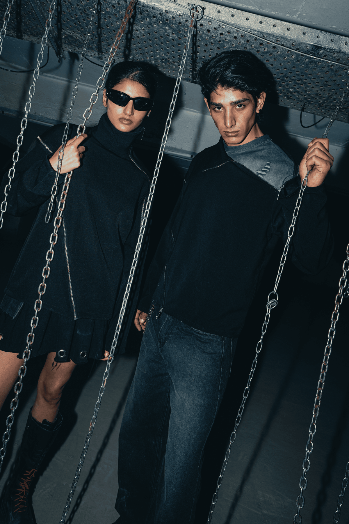 Black oversized shirt with a relaxed fit, featuring bold double zip detailing for a stylish, contemporary streetwear look