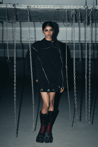 Relaxed-fit black shirt made from eco-friendly banana crepe fabric, designed for casual