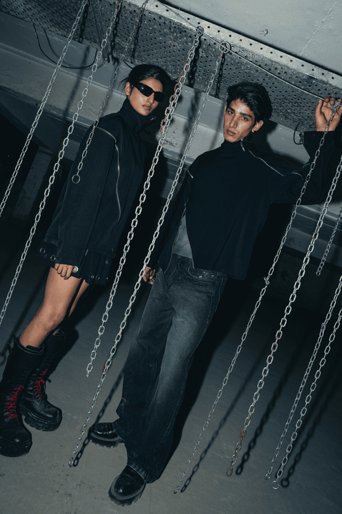 Black streetwear shirt made from breathable banana crepe fabric, with a modern relaxed fit and unique double zip detail enhancing its urban style